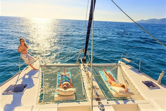 Catamaran sailing through turquoise waters en route to Île aux Cerfs island in Mauritius