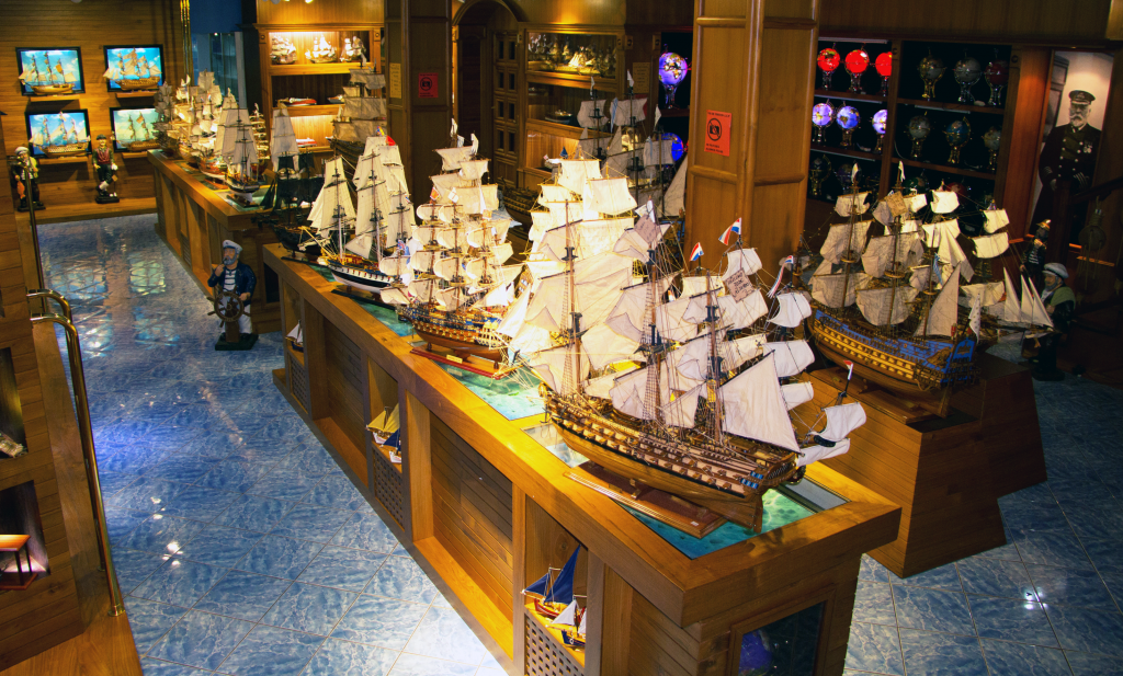 Traditional model boat craftsmanship at the historic naval and boat building factory in Port Louis, Mauritius