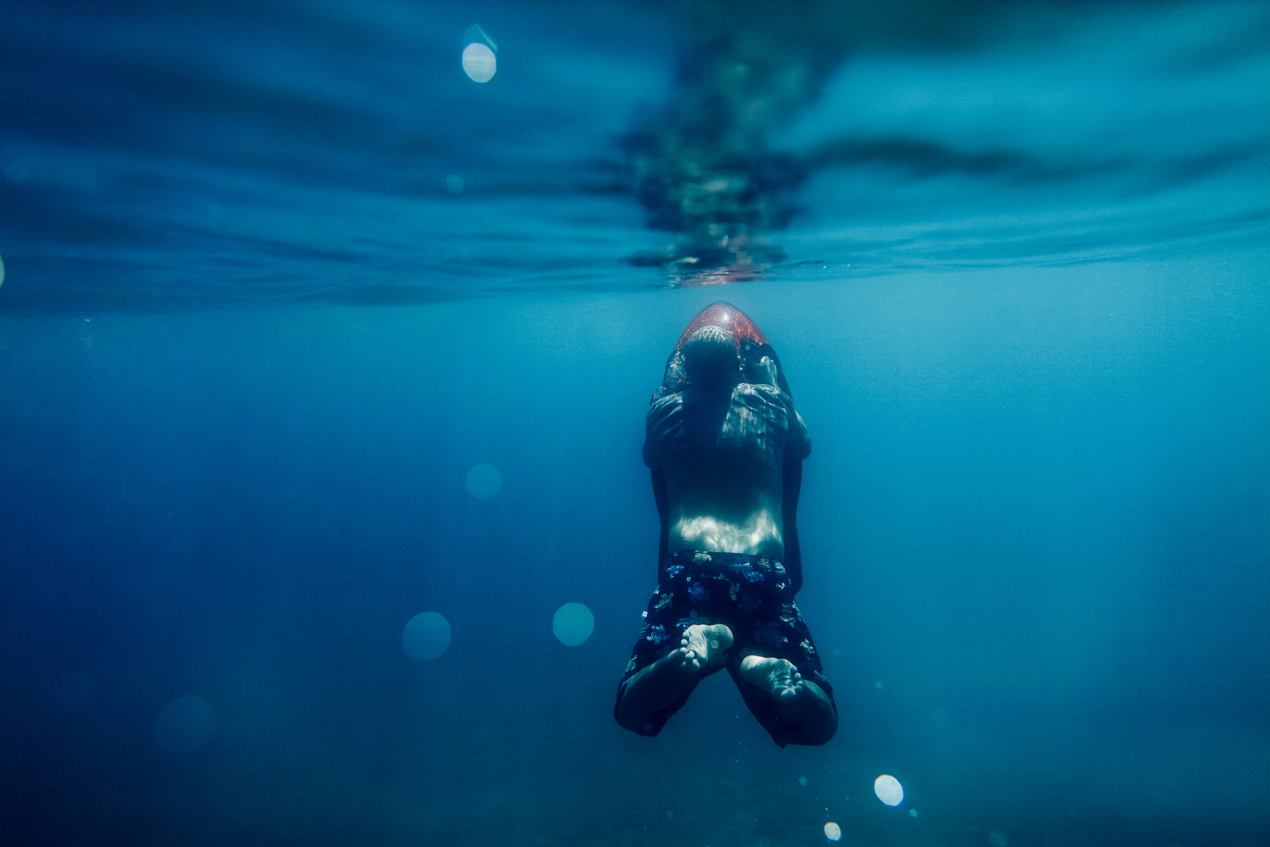 underwater scooter seabob unidentified man dive snorkling deep sea water