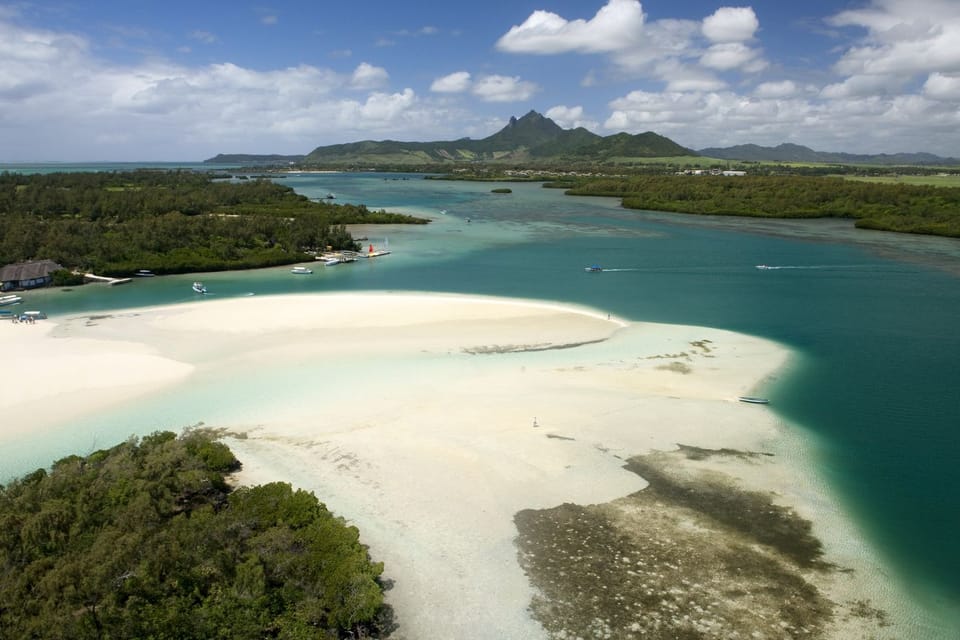 Overhead shot of white sand and turquoise waters at Île aux Cerfs island