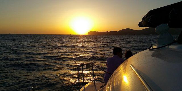 View from a catamaran during golden hour on a private cruise in Mauritius