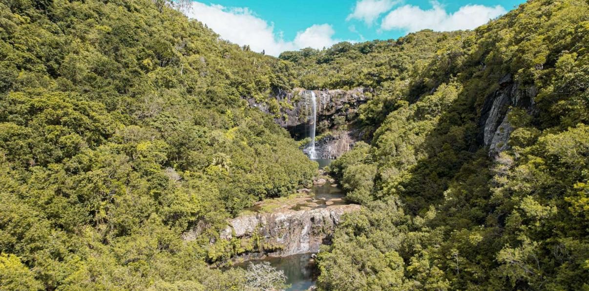 Aerial view of Tamarind Falls surrounded by lush greenery in Mauritius